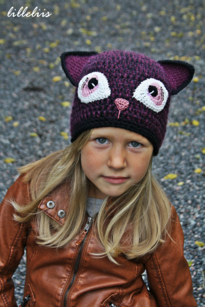 Crochet hat with cat eyes