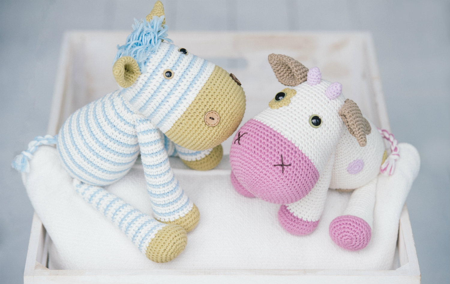 Crochet zebra and cow from the book Cuddly Amigurumi Toys