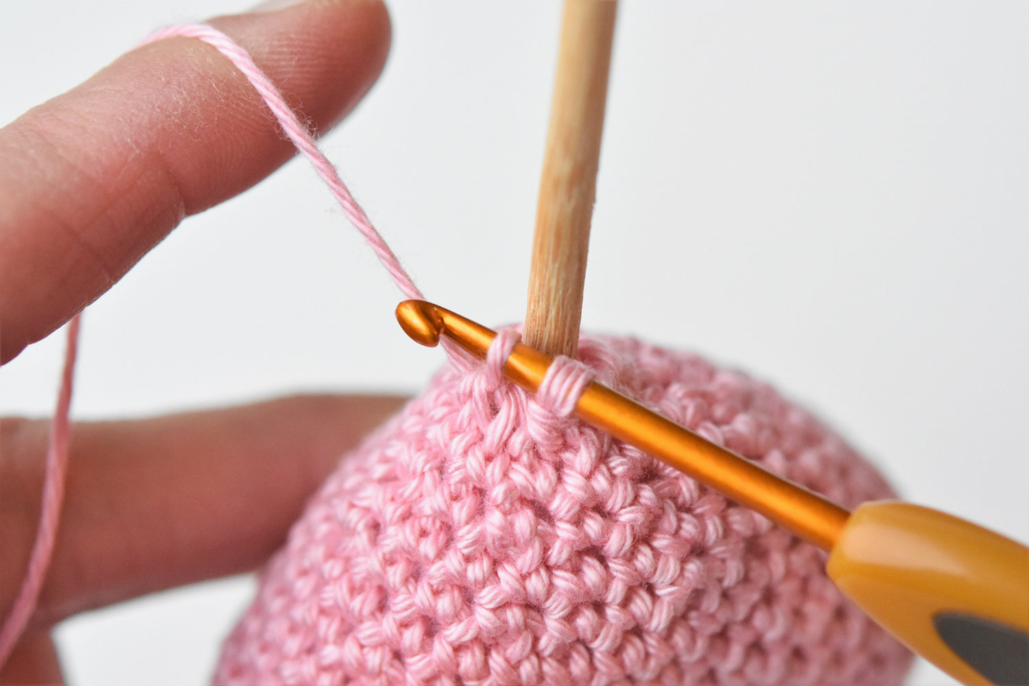 amigurumi hearts on a stick