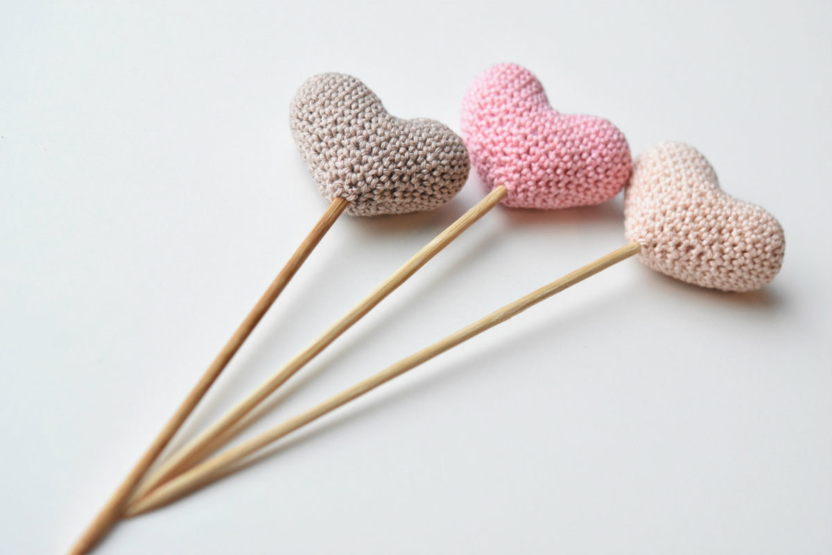 amigurumi hearts on a stick