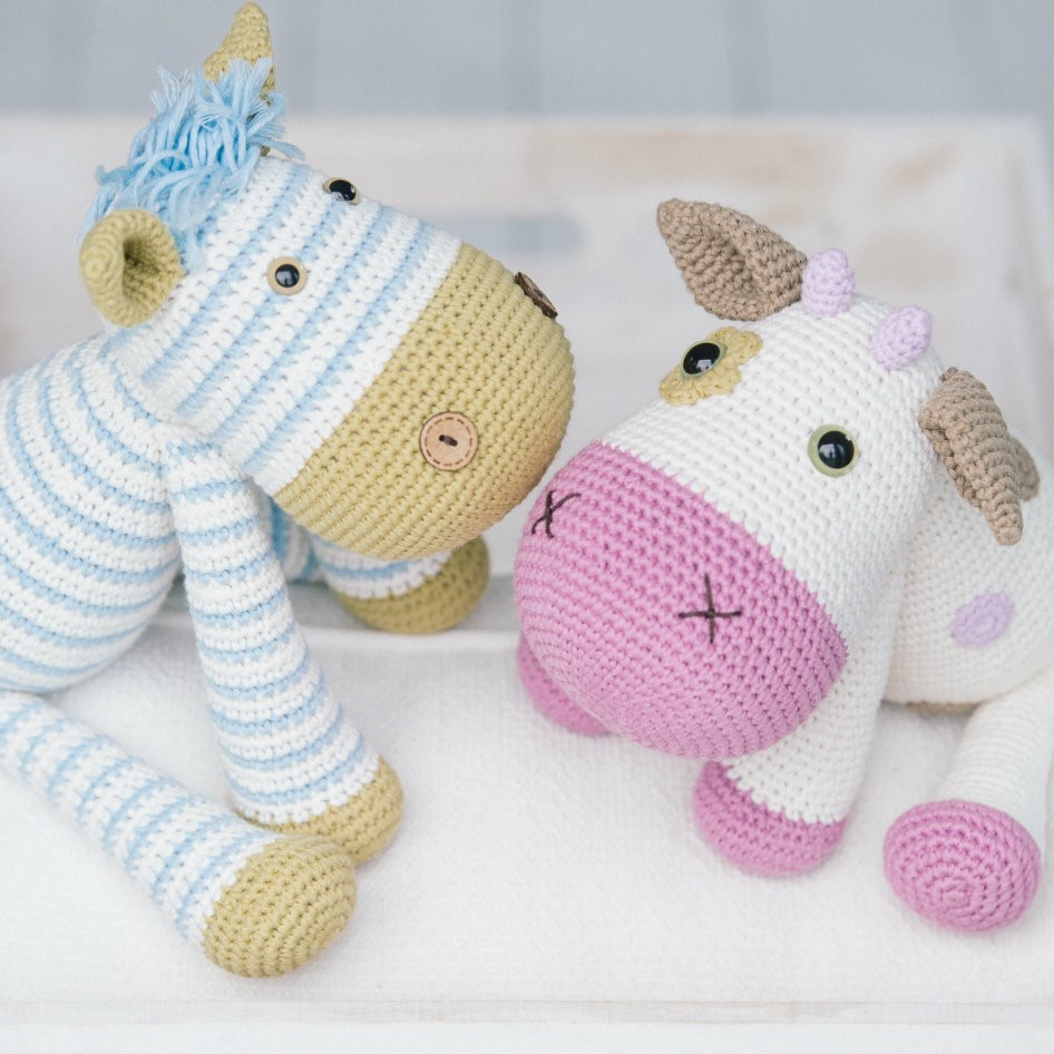 Crochet toys zebra and cow