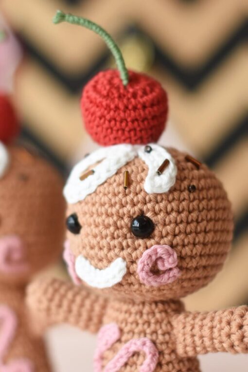 amigurumi gingerbread with a cherry on top