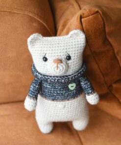 Teddy bear with a sweater and heart