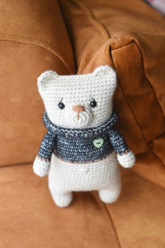 Teddy bear with a sweater and heart