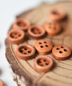 Õmblusega 4 auguga nööp