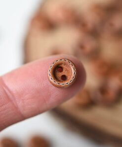 puidust nööp õmblusega