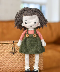 Crochet doll in wool skirt