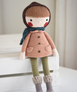 Crochet doll in a coat and bonnet