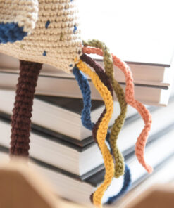 Kirju kukk heegeldatud saba