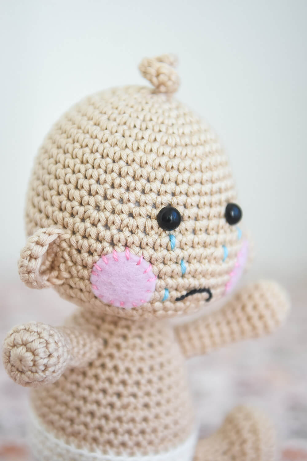 Amigurumi baby doll
